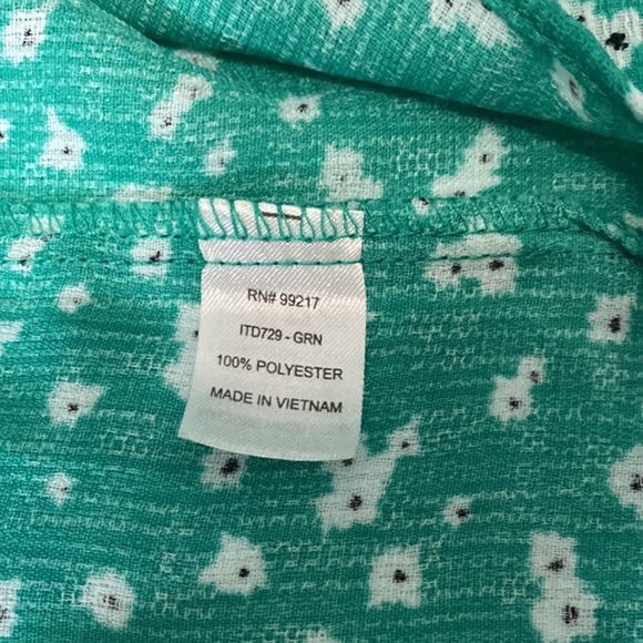 Comfortable short sleeve button front blouse with front tie. - Picture 3 of 5